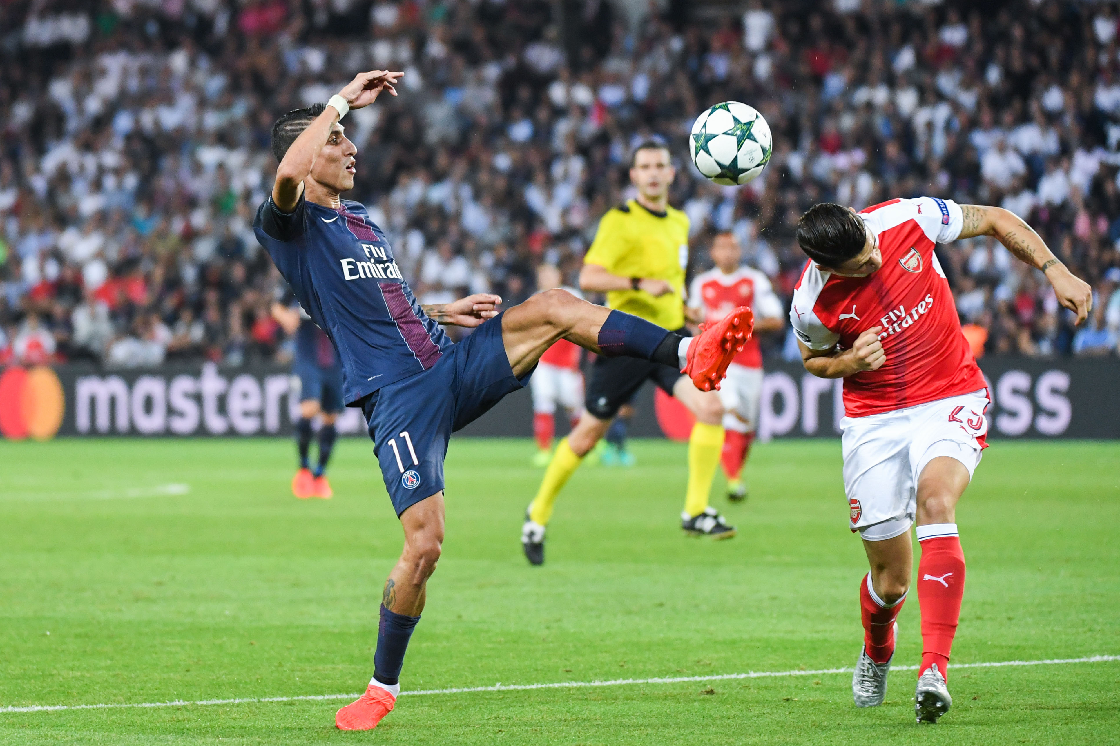 Angel Di Maria of Paris and Granit Xhaka of Arsenal during the Uefa Champions League match between Paris Saint Germain and Arsenal at Parc des Princes on September 13, 2016 in Paris, France. (Photo by Anthony Dibon/Icon Sport) (Photo by Anthony Dibon/Icon Sport via Getty Images)